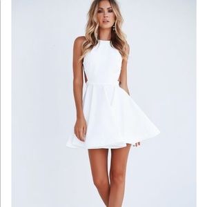 Xenia fortune backless mini dress. NWT, Size small